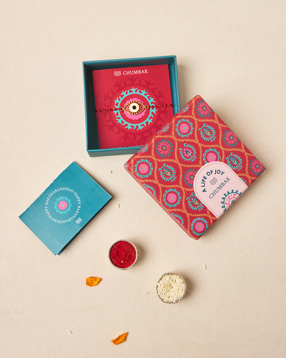 Evil-Eye Red Rakhi - Brass Motif