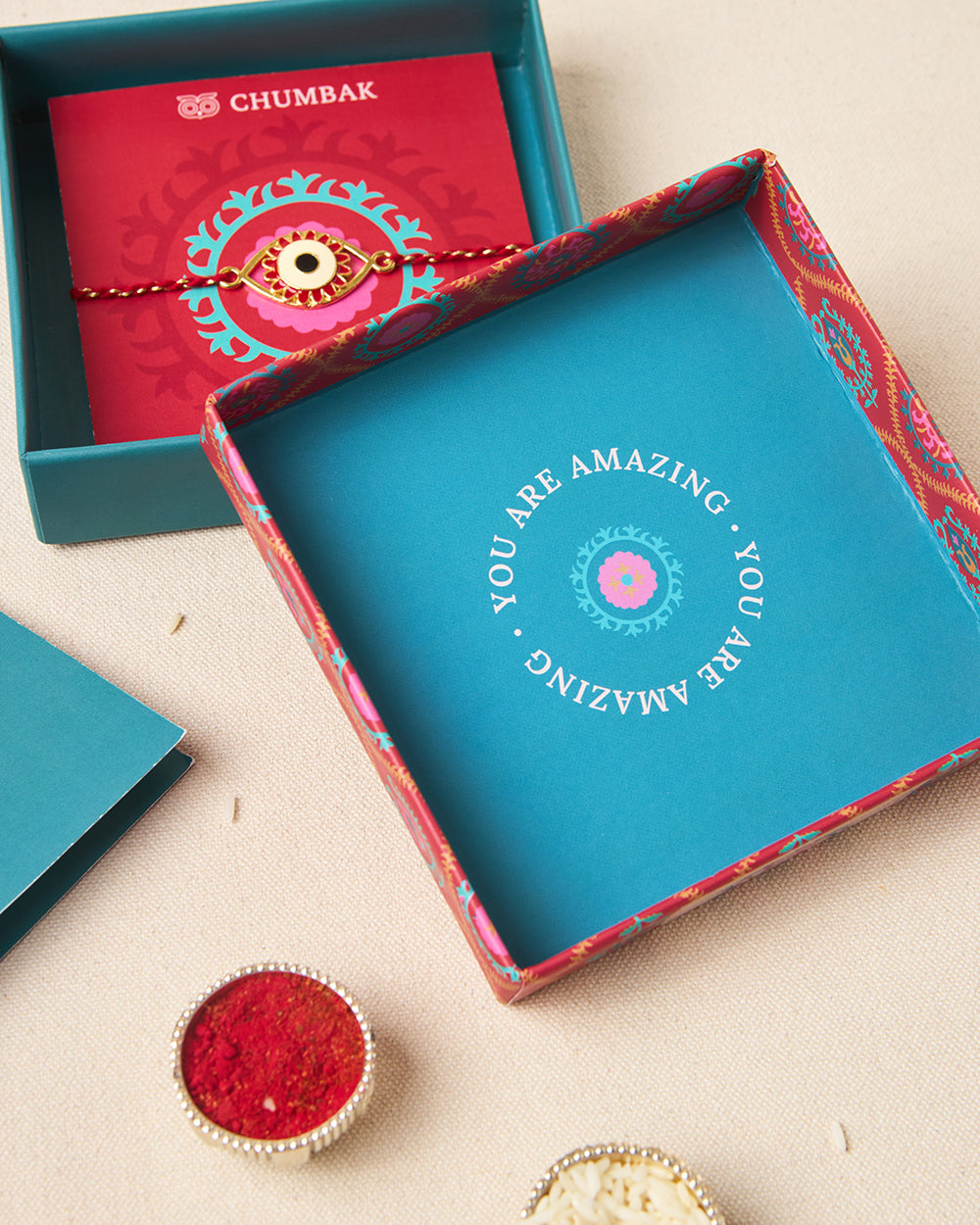 Evil-Eye Red Rakhi - Brass Motif