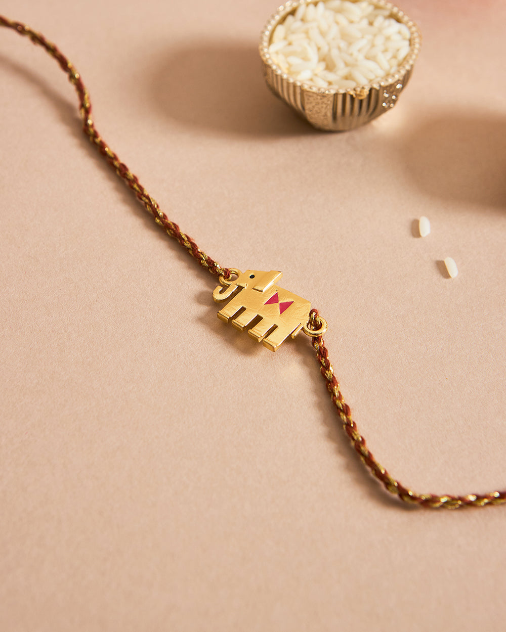 Tusker Rakhi - Brass Motif